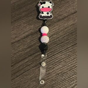 Cow badge reel